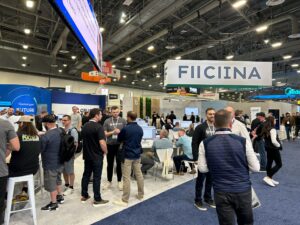 Builders walk the show floor at a trade show