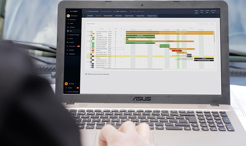 The Buildxact scheduling feature on a laptop screen