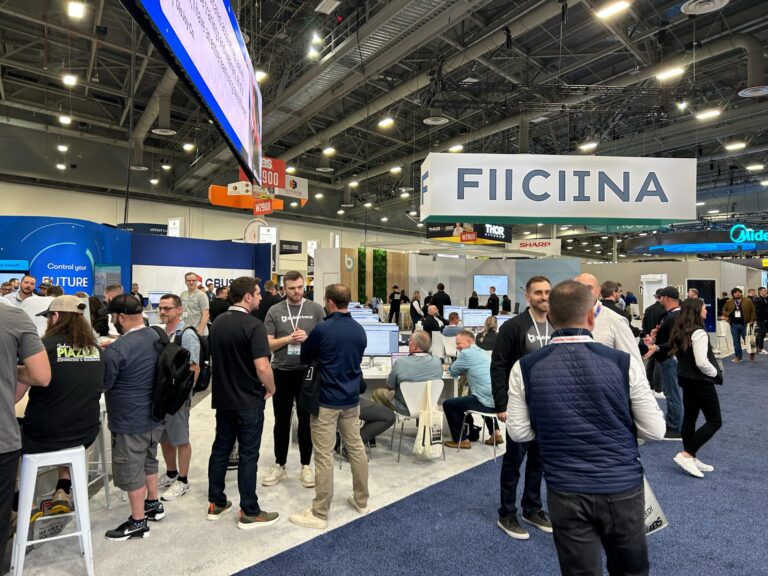 attendees of builders trade show walk the show floor