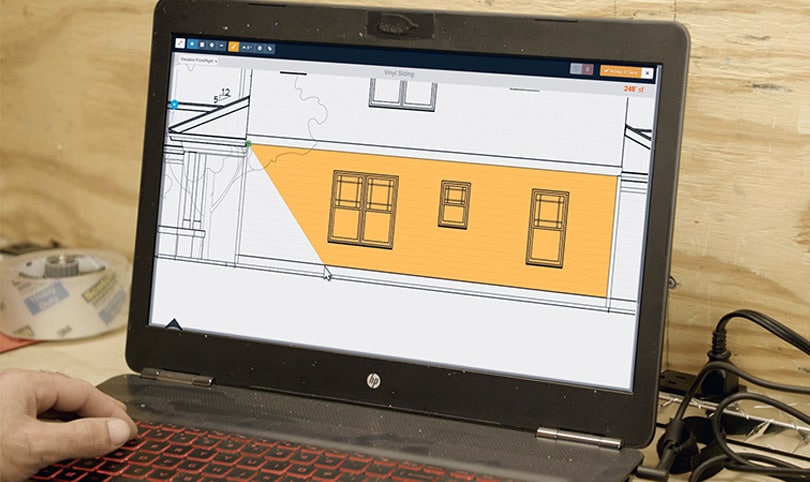 The buildxact takeoff tool in a laptop screen on a job site