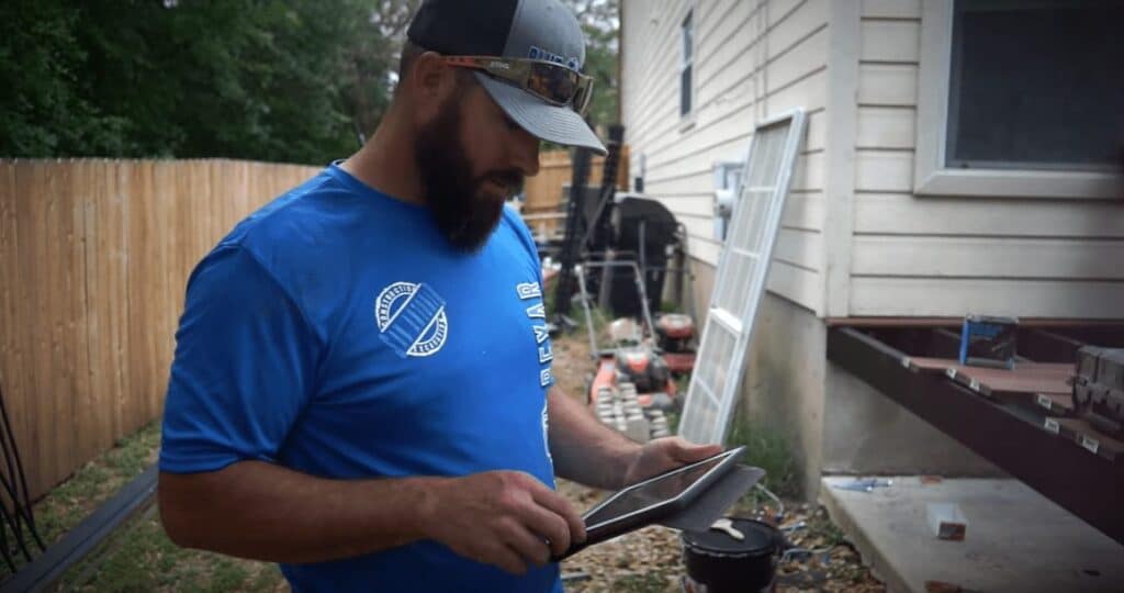 Buildxact customer Blue Bexar using Buildxact on-site via his iPad