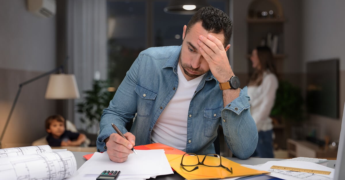 Stressed builder performing tasks manually