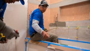 Express Kitchen and Bath remodeler works on a bathroom 